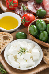 antipasti platter - fresh feta cheese, deli meats, olives