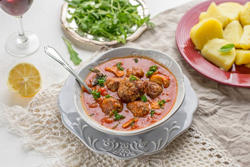 Meatballs albondigas in tomato sauce with mushrooms