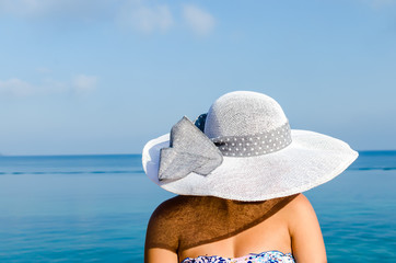 Young beautiful woman on the beach