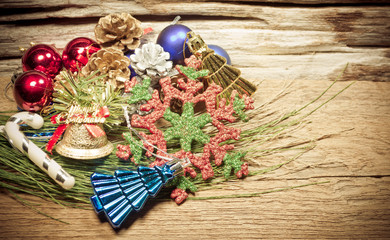 Chrismas baubles and vary of decoration on wood background