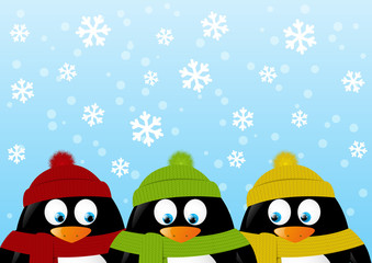 Cute cartoon penguins on winter background
