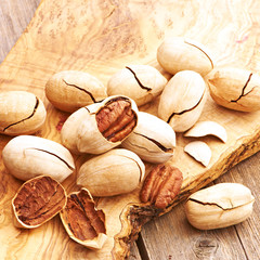 Pecan nuts on wooden table