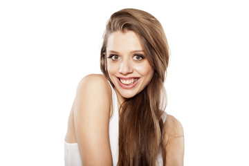Obraz premium happy beautiful young woman on a white background