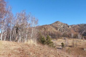 Mountain top against the blue sky