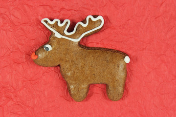 christmas reindeer gingerbread on red background
