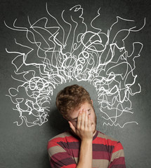 confused young man covering his head