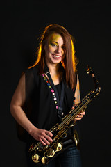 Obraz na płótnie Canvas woman with saxophone