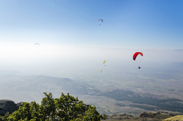 Paragliding above the high mountain