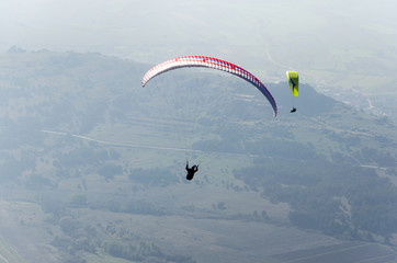 Paragliding above the mountain range