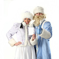 Obraz premium Santa with Santa girl show a white sheet