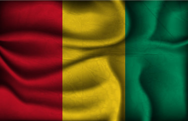 crumpled flag of Guinea on a light background