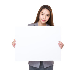 Businesswoman hold with white card board