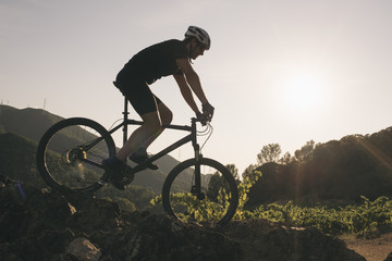 The young man cycling Cross-country