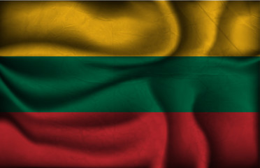 crumpled flag of Lithuania on a light background