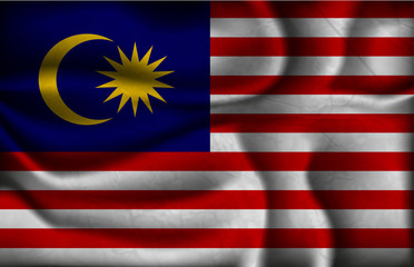 crumpled flag of Malaysia on a light background