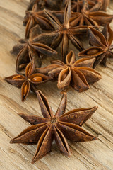 Star anise on wooden background