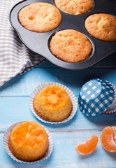 Homemade muffins with tangerines