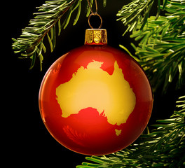 Red bauble with the golden shape of Australia