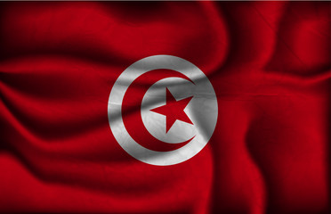 crumpled flag of Tunisia on a light background