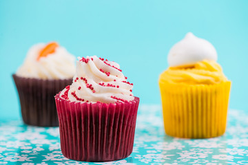 cup cakes on blue background