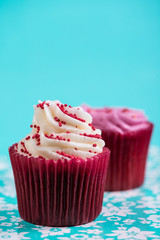 red cup cake on blue background