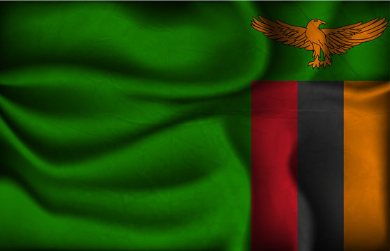 crumpled flag of Zambia on a light background