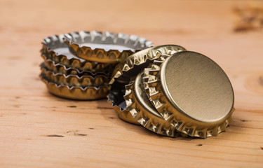 beer bottle caps on table