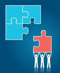 Teamwork concept - people building puzzle