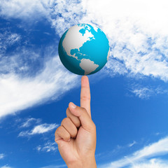 Earth globe icon on hand