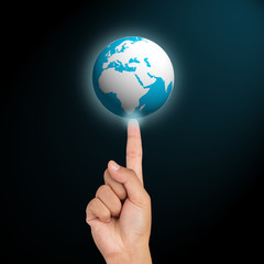 Earth globe icon on hand