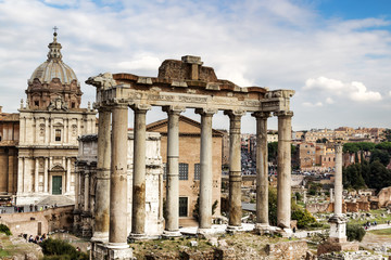 Fototapeta na wymiar Ruins of the Temple of Saturn in the Roman Forum.