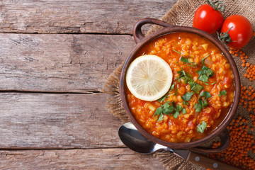 red lentil soup with lemon horizontal view from above