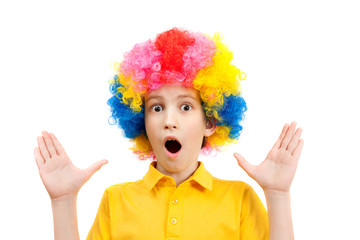 surprised the boy in the bright multi-colored wig - 74151657