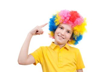 boy pointing his finger at his multi-coloured wig