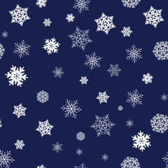 Snowflake on blue background seamless pattern