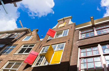 Fototapeta na wymiar Facades of houses in old city in Amsterdam