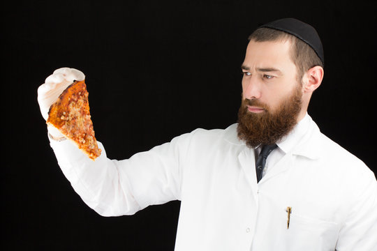Bearded jewish doctor holding pizza.