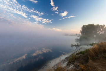 Beautiful morning with rising sun on lake