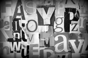 Magazine and newspaper letters collage in black and white