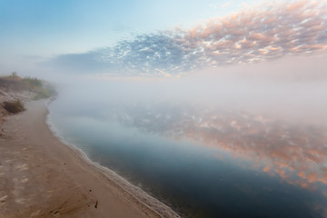 Beautiful morning with rising sun on lake