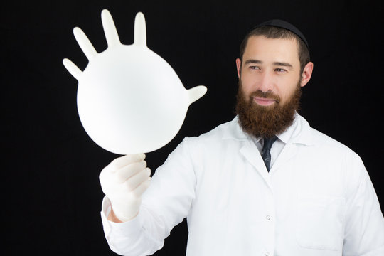 Bearded Doctor Holding Inflated Glove.