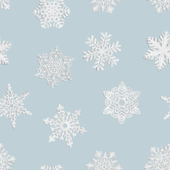 Seamless background of home-made paper snowflakes.