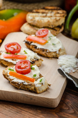 Healthy baguette, spread curd cheese with vegetable and herbs