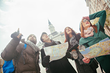 Four Tourists Sightseeing City