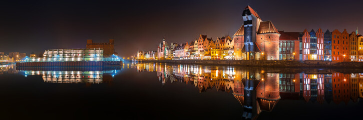 Fototapeta premium Panorama of Gdansk old town with reflection in Motlawa river