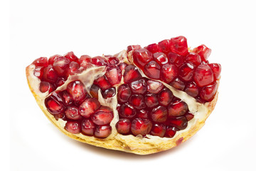 Juicy pomegranate isolated on white background