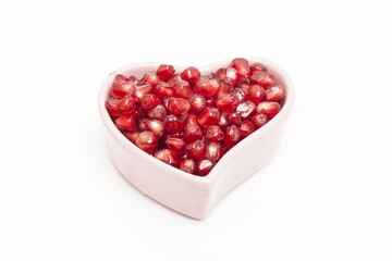Juicy pomegranate isolated on white background