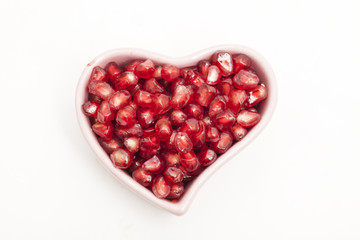 Juicy pomegranate isolated on white background
