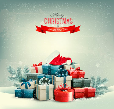 Holiday Christmas background with gift boxes and a santa hat. Ve