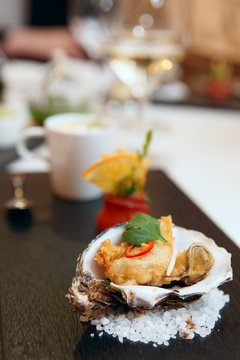 Tempura fried oyster in shell